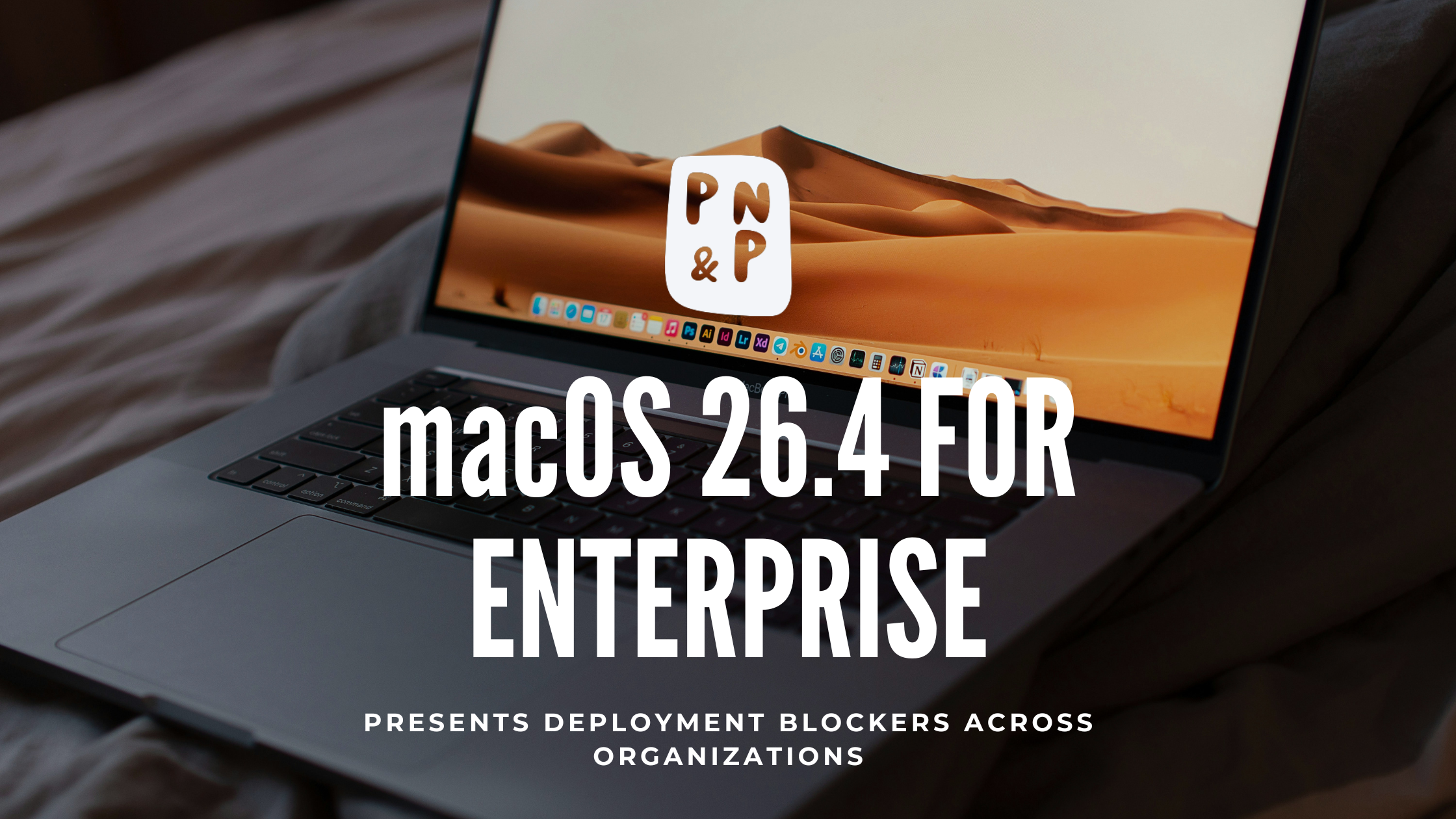 A MacBook with a desert wallpaper. Photo by Dima Solomin on Unsplash.